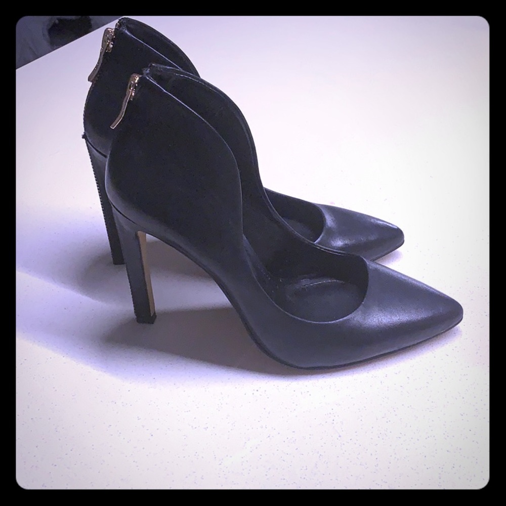Size 6 black stilettos with zipper accent